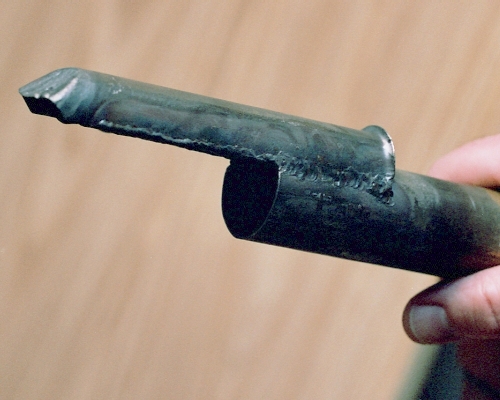 Front and side view of the finished intake/tailpipe assembly. The downturned lip is formed entirely by heating and hammering. Photo Copyright 2005 Larry Cottrill