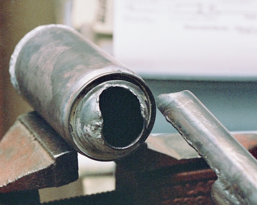 The rear of the chamber slotted out for the intake assembly - done by melting the edge back with a small flame. Photo Copyright 2005 Larry Cottrill