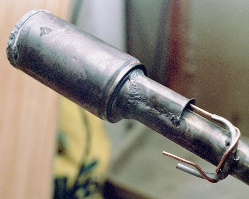 The finished weld between the pipe assembly and the chamber - yes, I had to patch a few holes. I also added the air/fuel pipe assembly for this shot. Photo Copyright 2005 Larry Cottrill